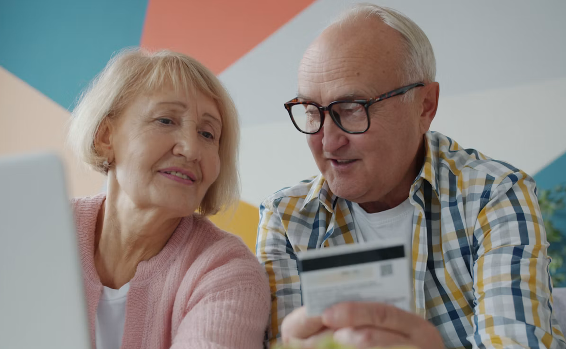 Customers reviewing their banking together
